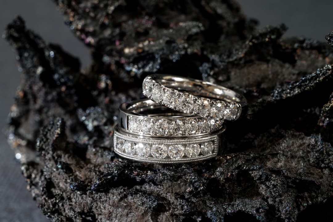 Spencer Morgan Jewellers diamond bands on dark anthracite coral, photographed by Marc Smith Photography for Spencer Morgan